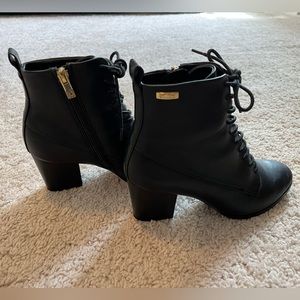 Calvin Klein black leather, lace-up, heeled booties. Size 5.